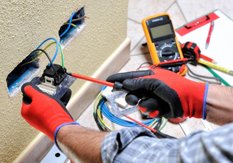 residential electrician doing electrical work